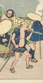 籠を担ぐ人（前）