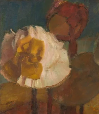 左側の大きな白い帽子