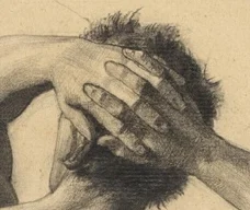 頭の後ろで組まれた手