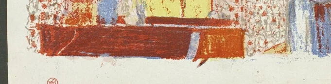 手前の濃い赤の家具