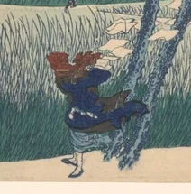 風に耐える左下の人物