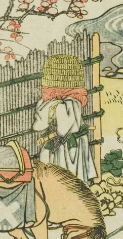 深編笠を被った旅人