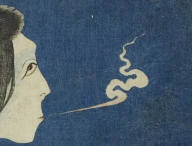 口から吐き出される息（煙）