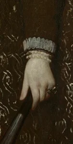 扇子を持つ左手