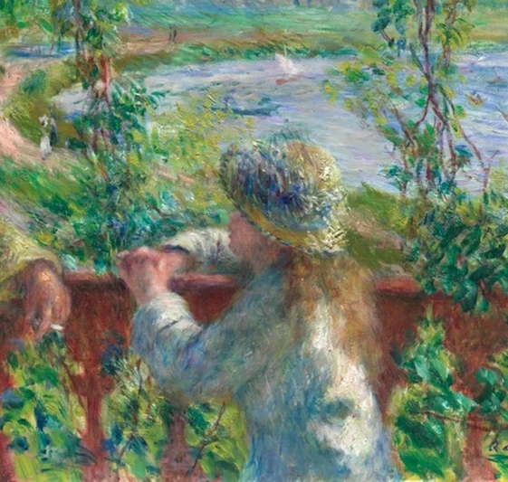 手すりに寄りかかる女性