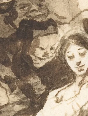 背後の嘲笑するような顔