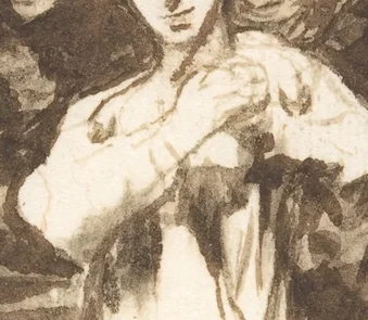 胸元で組まれた手