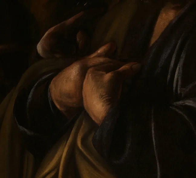 否定するペテロの手