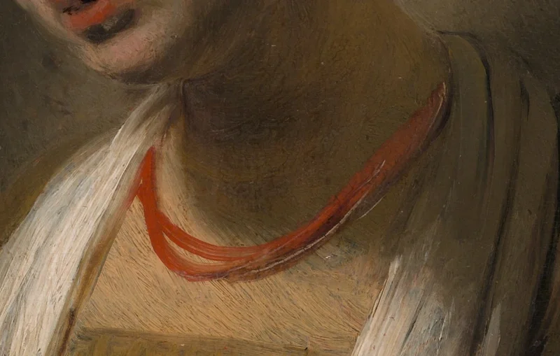 二重の赤いネックレス