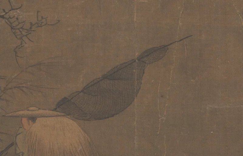 肩に担いだ漁網