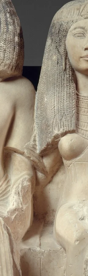 夫の肩を抱くレネヌテトの右腕